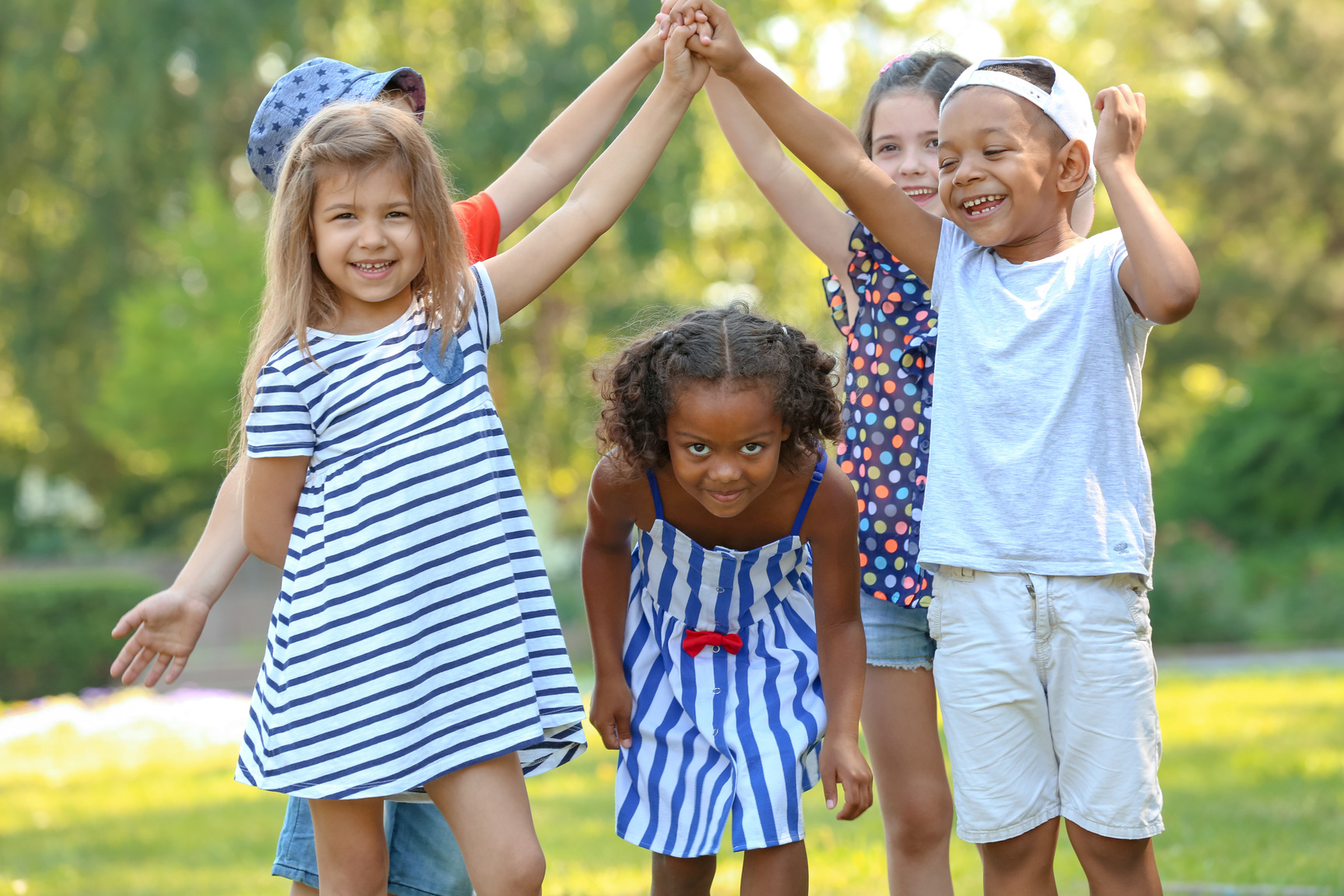 A Group of Diverse Children Playing Outdoors